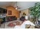 Cozy living room with a vaulted ceiling, fireplace, and comfortable seating area at 1409 Bloomingdale Ln, Mount Pleasant, SC 29466