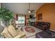 Comfortable living room with fireplace, TV, and plush seating at 1409 Bloomingdale Ln, Mount Pleasant, SC 29466