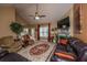 Spacious living room with fireplace, large windows, and cozy seating at 1409 Bloomingdale Ln, Mount Pleasant, SC 29466