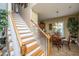 Open staircase with wood steps and white risers, leading to the upper level at 1409 Bloomingdale Ln, Mount Pleasant, SC 29466