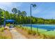 The community tennis court offers a shaded rest area for relaxation in between matches at 1409 Bloomingdale Ln, Mount Pleasant, SC 29466
