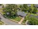 This aerial view shows the lovely brick home with mature trees and well-maintained yard on a corner lot at 141 Tall Pines Rd, Ladson, SC 29456