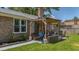Enjoy this backyard pergola with outdoor seating, swing, and space for a grill, great for outdoor living at 141 Tall Pines Rd, Ladson, SC 29456