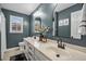 Stylish bathroom with double vanity, modern fixtures, and serene blue walls at 141 Tall Pines Rd, Ladson, SC 29456