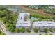 Aerial view of condo buildings, showing the parking and community pool at 145 Pier View St # 214, Daniel Island, SC 29492