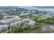 Aerial view of condo community showing water views and bridge in the distance at 145 Pier View St # 214, Daniel Island, SC 29492