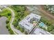 Condo buildings shown from an aerial view, adjacent to marshlands and pool at 145 Pier View St # 214, Daniel Island, SC 29492
