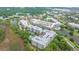 A picturesque aerial view of a condominium community situated near a marsh at 145 Pier View St # 214, Daniel Island, SC 29492