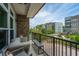 Private balcony with comfortable seating and community views at 145 Pier View St # 214, Daniel Island, SC 29492