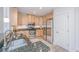 Well-equipped kitchen featuring granite countertops, stainless steel appliances, and ample cabinet space at 145 Pier View St # 214, Daniel Island, SC 29492