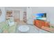 Comfortable living room featuring a sofa, accent chair, TV, and stylish decor creating a relaxing space at 145 Pier View St # 214, Daniel Island, SC 29492