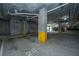 Parking garage with clearly marked parking spaces, and overhead lighting at 145 Pier View St # 214, Daniel Island, SC 29492