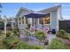 Backyard features beautiful seating, a garden, privacy, and curb appeal at 148 Longdale Dr, Summerville, SC 29483