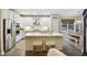 Gourmet kitchen features stainless steel appliances, a center island with seating, and modern lighting fixtures at 148 Longdale Dr, Summerville, SC 29483
