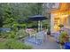 Outdoor patio with comfortable seating, colorful accents, and lush surroundings perfect for relaxation at 148 Longdale Dr, Summerville, SC 29483
