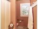 Bathroom featuring a toilet, shower, grab bar, towel and stained glass window at 152 Mansfield Blvd, Charleston, SC 29418