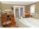 Well-lit bedroom with desk, bed, and wooden floors at 152 Mansfield Blvd, Charleston, SC 29418