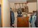 Organized closet with ample storage, clothing racks, and decorative handbags at 152 Mansfield Blvd, Charleston, SC 29418