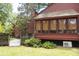 Exterior of the home featuring a sunroom and fenced yard at 152 Mansfield Blvd, Charleston, SC 29418