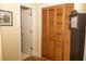 Hallway with closet doors and decorative grandfather clock at 152 Mansfield Blvd, Charleston, SC 29418