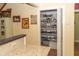 Charming kitchen with granite counters, pantry, and vintage decor at 152 Mansfield Blvd, Charleston, SC 29418