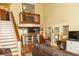 Spacious living room with staircase, high ceilings, and open access to the kitchen at 152 Mansfield Blvd, Charleston, SC 29418