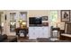 Living room with television, cabinets, lamps and patio doors at 152 Mansfield Blvd, Charleston, SC 29418
