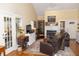 Comfortable living room with fireplace and French door to patio at 152 Mansfield Blvd, Charleston, SC 29418