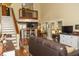 Inviting living room featuring open floor plan, high ceilings, staircase, and comfortable seating at 152 Mansfield Blvd, Charleston, SC 29418