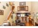 Open floor plan showcasing the stairs and kitchen, with views of the loft area at 152 Mansfield Blvd, Charleston, SC 29418