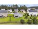 Aerial view of the spacious backyard with a screened porch and wooden fence, offering privacy and a serene outdoor space at 173 Southport Dr, Summerville, SC 29483