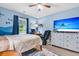 A cozy bedroom with a TV, dresser, bed, and stylish decor creating a relaxing space at 173 Southport Dr, Summerville, SC 29483