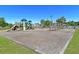 A playground with slides, climbing structures, and a wood chip ground cover offers endless fun and activity at 173 Southport Dr, Summerville, SC 29483