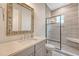 Updated bathroom design with a glass shower enclosure, granite vanity, and modern finishes for a spa-like feel at 183 Civitas St, Mount Pleasant, SC 29464