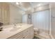 Cozy bathroom with ample cabinet space, a white vanity, and neutral tones creating a relaxing atmosphere at 183 Civitas St, Mount Pleasant, SC 29464