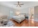 Bedroom with hardwood floors, ceiling fan, and chair with ottoman at 183 Civitas St, Mount Pleasant, SC 29464