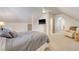 Bedroom with comfortable bedding, soft carpet, a dresser with a TV, and neutral colors, creating a relaxing space at 183 Civitas St, Mount Pleasant, SC 29464