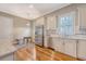 Spacious kitchen with stainless steel appliances, custom cabinetry, a breakfast nook, and ample natural light at 183 Civitas St, Mount Pleasant, SC 29464