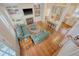 Open living space showing fireplace, custom built-ins, and hardwood floors, blending elegance with inviting comfort at 183 Civitas St, Mount Pleasant, SC 29464