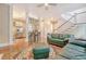 Open floor plan showcasing the living room, bar seating, and kitchen, perfect for entertaining at 183 Civitas St, Mount Pleasant, SC 29464