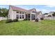 Expansive backyard featuring a well-maintained lawn and inviting patio area perfect for outdoor entertaining at 193 Cypress Forest Dr, Moncks Corner, SC 29461