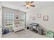 Bedroom featuring a crib, changing table, and seating area at 193 Cypress Forest Dr, Moncks Corner, SC 29461