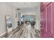 Inviting foyer leading to a spacious living area with hardwood floors and an open floor plan at 193 Cypress Forest Dr, Moncks Corner, SC 29461