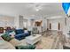 Spacious open-concept living room featuring hardwood floors, comfortable sofas, and dining area at 193 Cypress Forest Dr, Moncks Corner, SC 29461