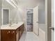 Bathroom featuring a double sink vanity with granite countertop and marble floors at 2005 Isabela Ct, Summerville, SC 29483