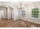 Dining room featuring hardwood floors, natural light, and modern lighting at 2005 Isabela Ct, Summerville, SC 29483