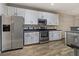 Kitchen featuring stainless steel appliances, modern cabinetry, and stone countertops at 2005 Isabela Ct, Summerville, SC 29483