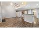 Open-concept living space showcasing hardwood floors, natural light and a spacious layout at 2005 Isabela Ct, Summerville, SC 29483