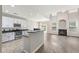 Spacious area boasts luxury floors, a fireplace with an alcove, and an open-concept design at 2005 Isabela Ct, Summerville, SC 29483