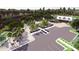 Aerial view of the community showcasing the tennis courts, parking, walking paths, and pool area with well-maintained landscaping at 201 Terrace View Dr, Summerville, SC 29486